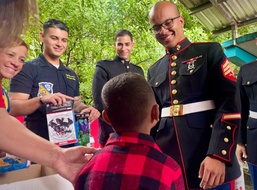 Puerto Rican Officer of the Blue Angels Transforms Her Childhood Hardships into Christmas Smiles for Less Fortunate Children of the Island
