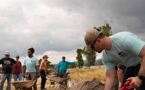JTF-Bravo volunteers build a home in local community