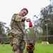 8th Military Police Brigade working dog handler and military working dog, pose for a photo on Scofield Barracks.