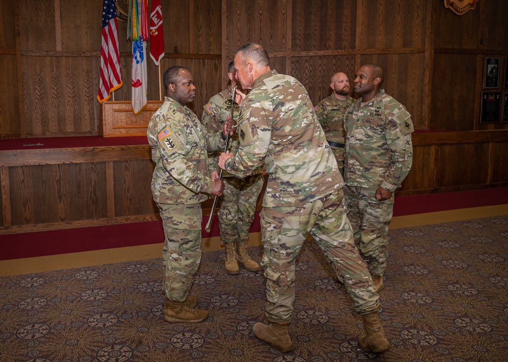USAES says farewell to Registe, welcomes Gadsden during change-of-responsibility ceremony.