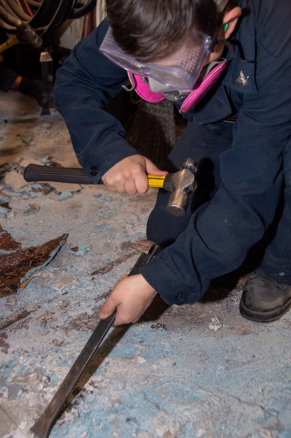 USS Ronald Reagan (CVN 76) Sailors conduct deck demolition