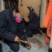 USS Ronald Reagan (CVN 76) Sailors conduct deck demolition