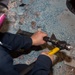 USS Ronald Reagan (CVN 76) Sailors conduct deck demolition