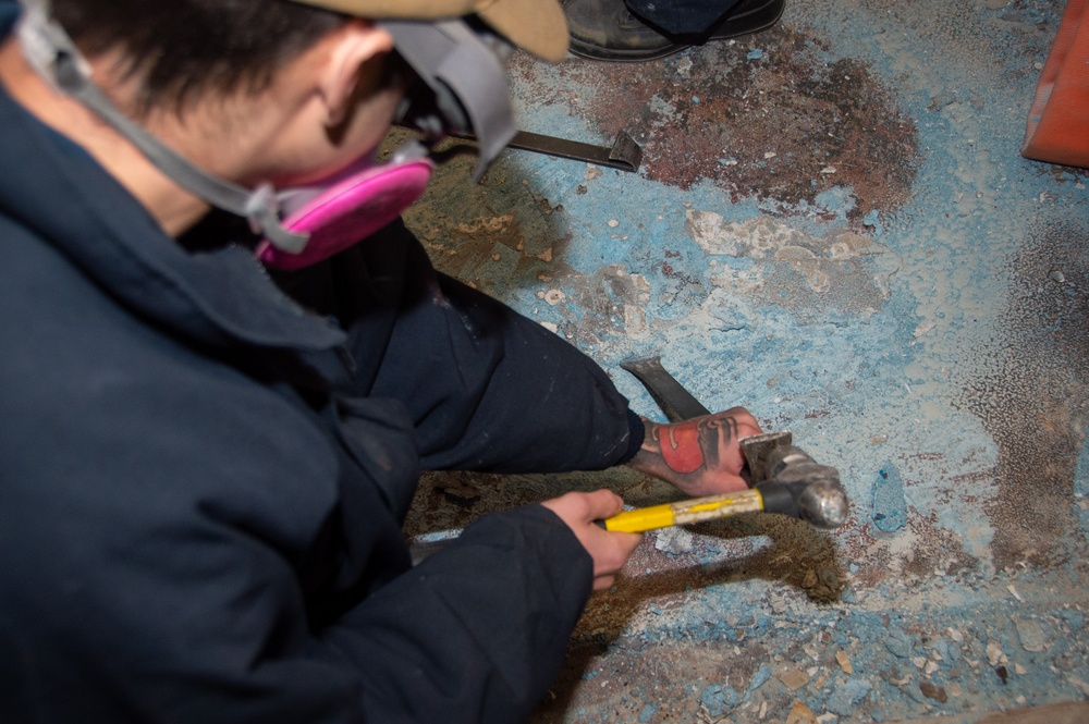 USS Ronald Reagan (CVN 76) Sailors conduct deck demolition