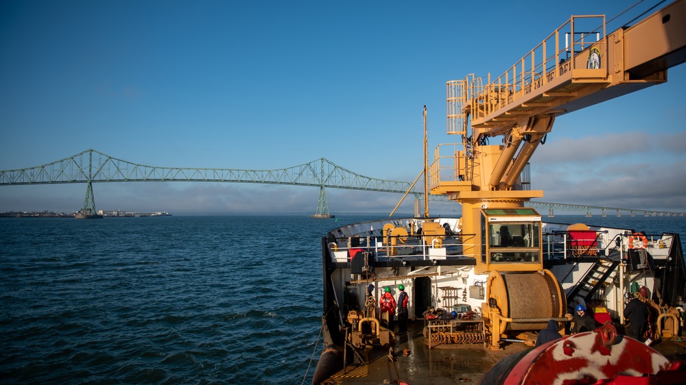 USCGC Elm transits through the Columbia River to work on aids to navigation