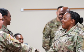 Brig. Gen. Tomika Seaberry greets soldier