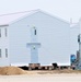 Contractors finish moving World War II-era barracks buildings to new foundations at Fort McCoy