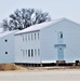 Contractors finish moving World War II-era barracks buildings to new foundations at Fort McCoy