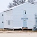 Contractors finish moving World War II-era barracks buildings to new foundations at Fort McCoy