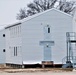 Contractors finish moving World War II-era barracks buildings to new foundations at Fort McCoy