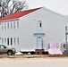 Contractors finish moving World War II-era barracks buildings to new foundations at Fort McCoy