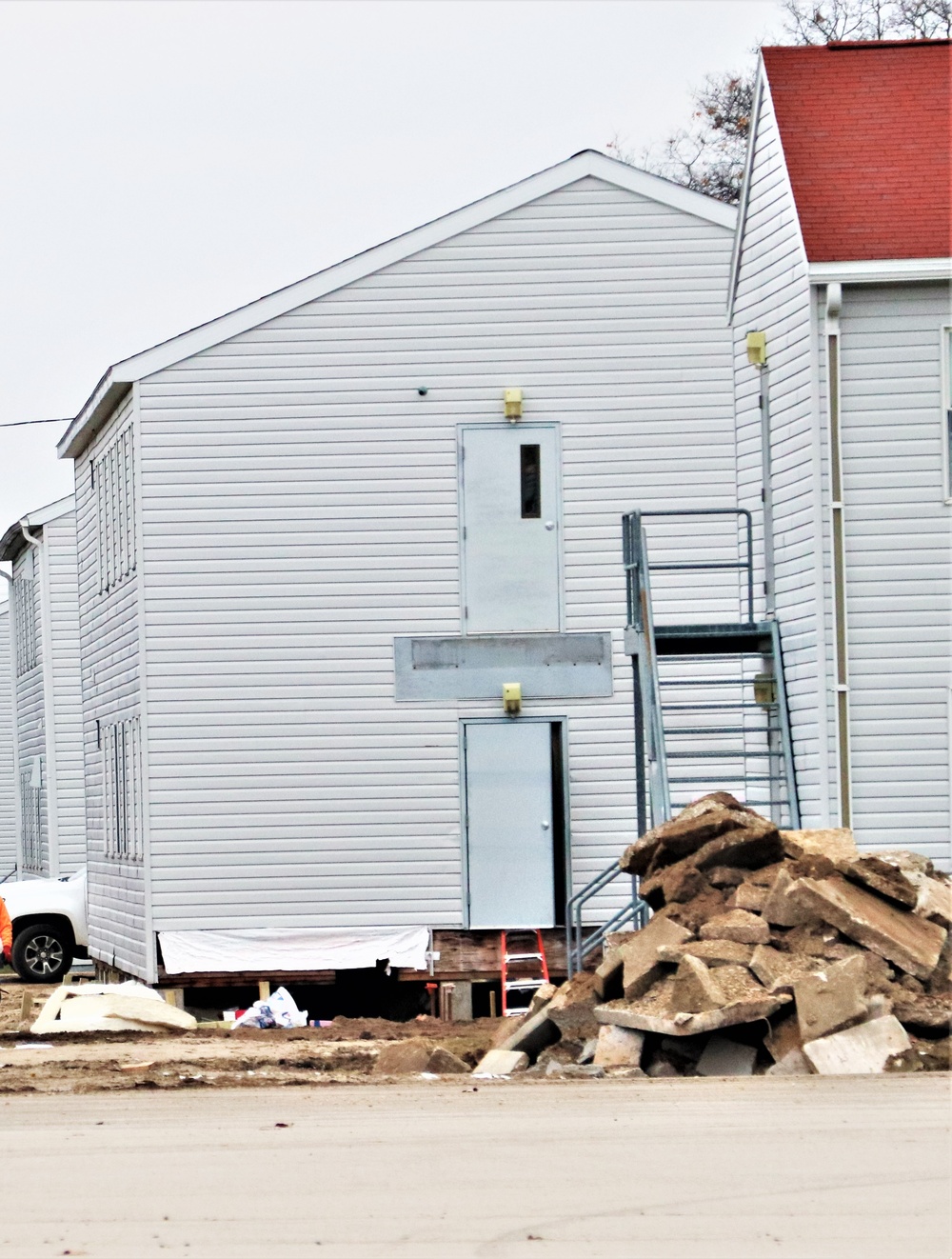 Contractors finish moving World War II-era barracks buildings to new foundations at Fort McCoy