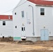 Contractors finish moving World War II-era barracks buildings to new foundations at Fort McCoy