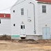 Contractors finish moving World War II-era barracks buildings to new foundations at Fort McCoy