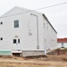 Contractors finish moving World War II-era barracks buildings to new foundations at Fort McCoy