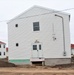 Contractors finish moving World War II-era barracks buildings to new foundations at Fort McCoy