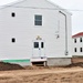 Contractors finish moving World War II-era barracks buildings to new foundations at Fort McCoy