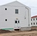 Contractors finish moving World War II-era barracks buildings to new foundations at Fort McCoy