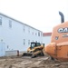 Contractors finish moving World War II-era barracks buildings to new foundations at Fort McCoy