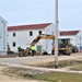 Contractors finish moving World War II-era barracks buildings to new foundations at Fort McCoy