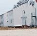 Contractors finish moving World War II-era barracks buildings to new foundations at Fort McCoy