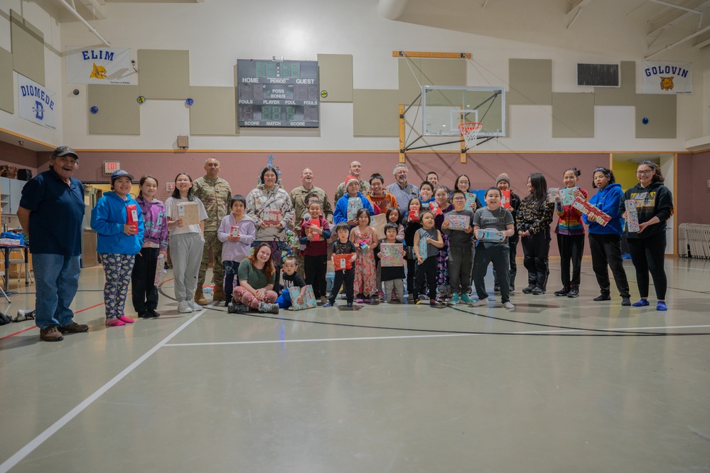 Spreading holiday cheer in Wales, Alaska: PRSC flies Christmas gifts into Alaskan remote school