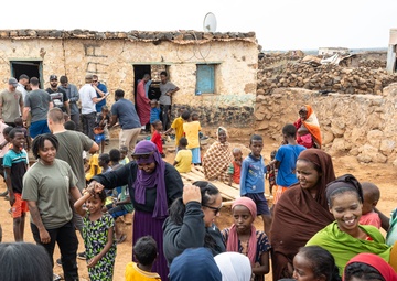 CJTF-HOA volunteers deliver books, various supplies to locals