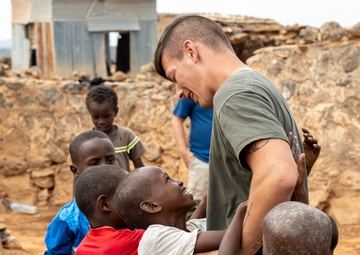 CJTF-HOA volunteers deliver books, various supplies to locals