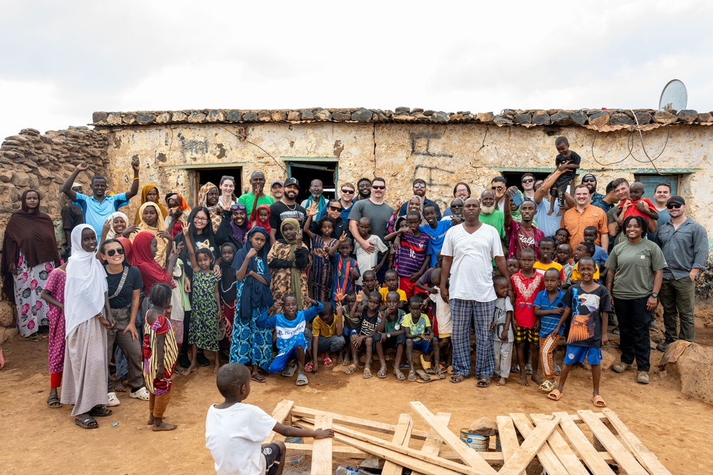 CJTF-HOA volunteers deliver books, various supplies to locals