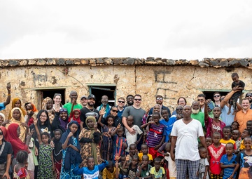 CJTF-HOA volunteers deliver books, various supplies to locals