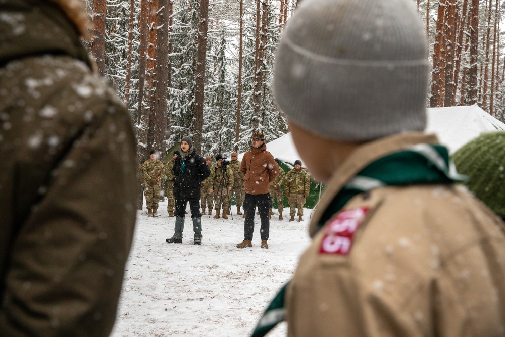 3rd Infantry Division Artillery medics provide first-aid training to children at Latvian winter camp