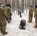 3rd Infantry Division Artillery medics provide first-aid training to children at Latvian winter camp