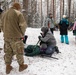 3rd Infantry Division Artillery medics provide first-aid training to children at Latvian winter camp