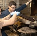 USS Bataan Sailors Sort Trash