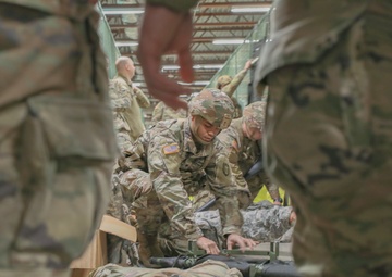 U.S. Army Reserve Soldier opens a liter during Combat Lifesaver Course