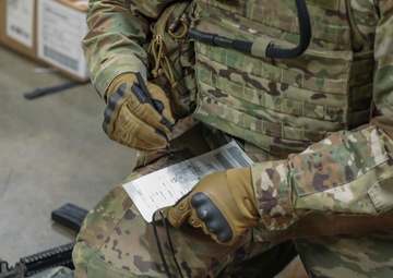 U.S. Army Reserve Soldier fills out Tactical Combat Casualty Care card during Combat Lifesaver Course