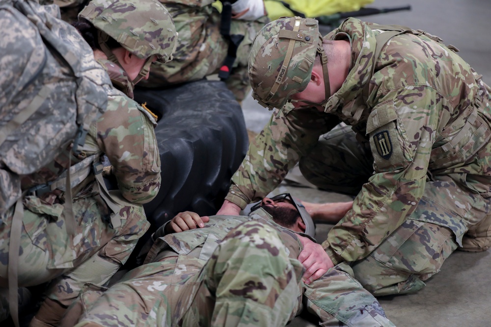 U.S. Army Reserve Soldiers checks on casualty during Combat Lifesaver Course