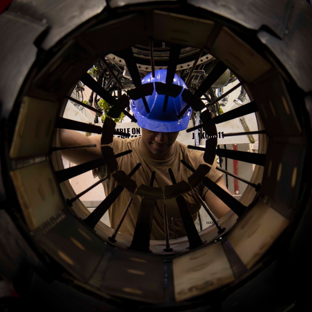 USS Carl Vinson (CVN 70) Sailor Conducts Engine Maintenance