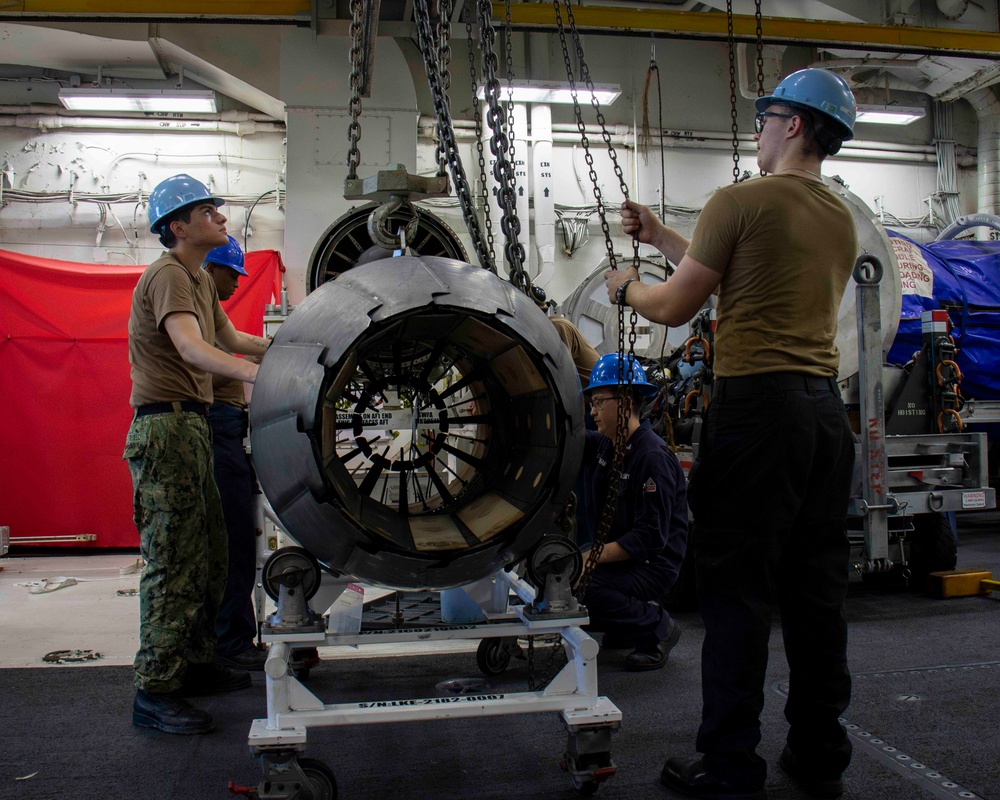 USS Carl Vinson (CVN 70) Sailors Conduct Engine Maintenance