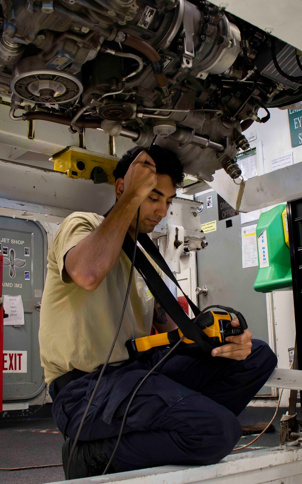 USS Carl Vinson (CVN 70) Sailor Conducts Engine Maintenance