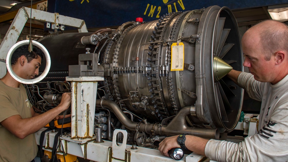 USS Carl Vinson (CVN 70) Sailors Conduct Engine Maintenance