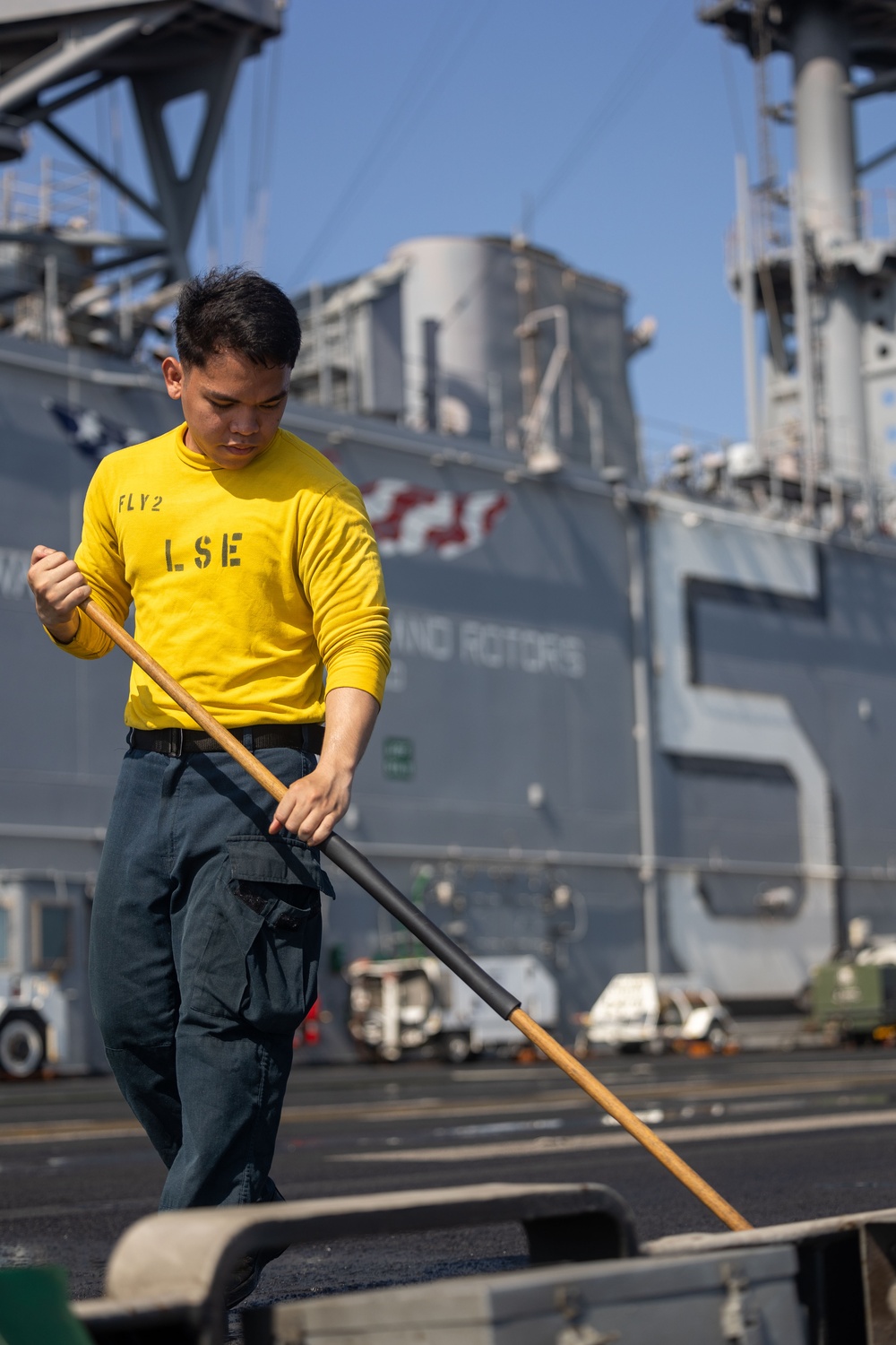 Dvids Images Uss Bataan Sailors Scrub The Flight Deck Image Of