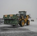 Team Little Rock operates under snowfall