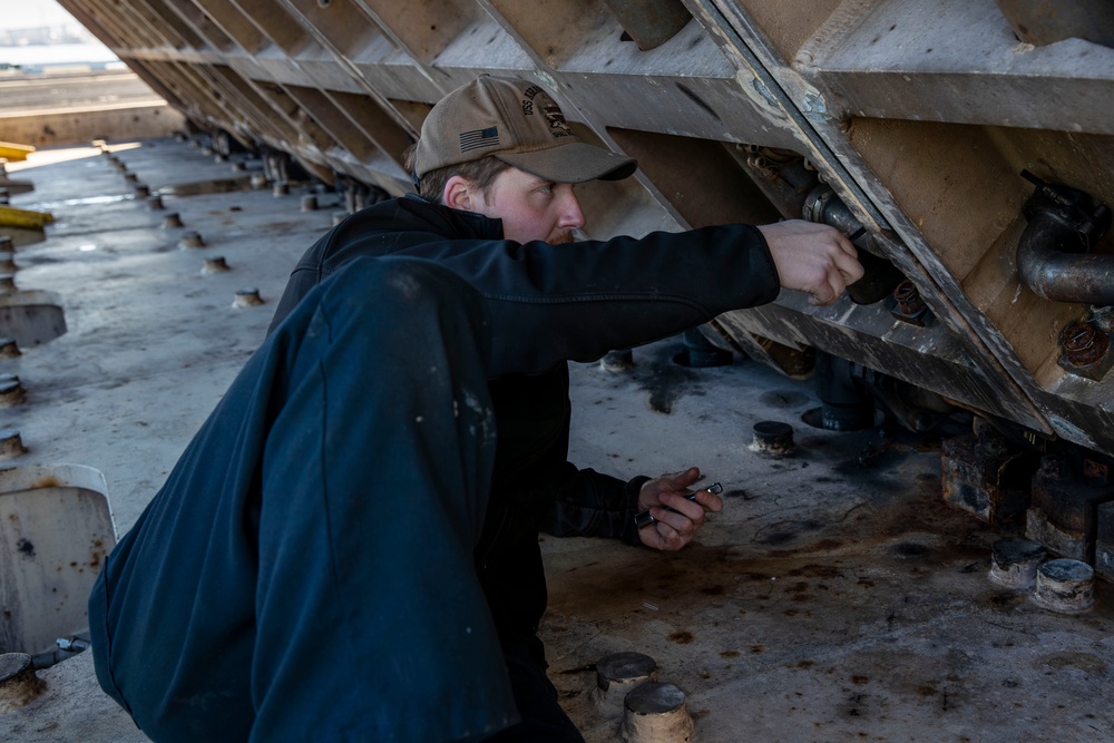 Sailors conduct preventative maintenance