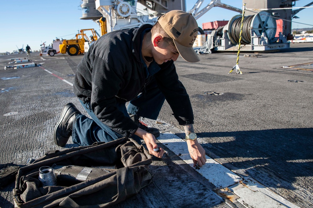 Sailors conduct preventative maintenance