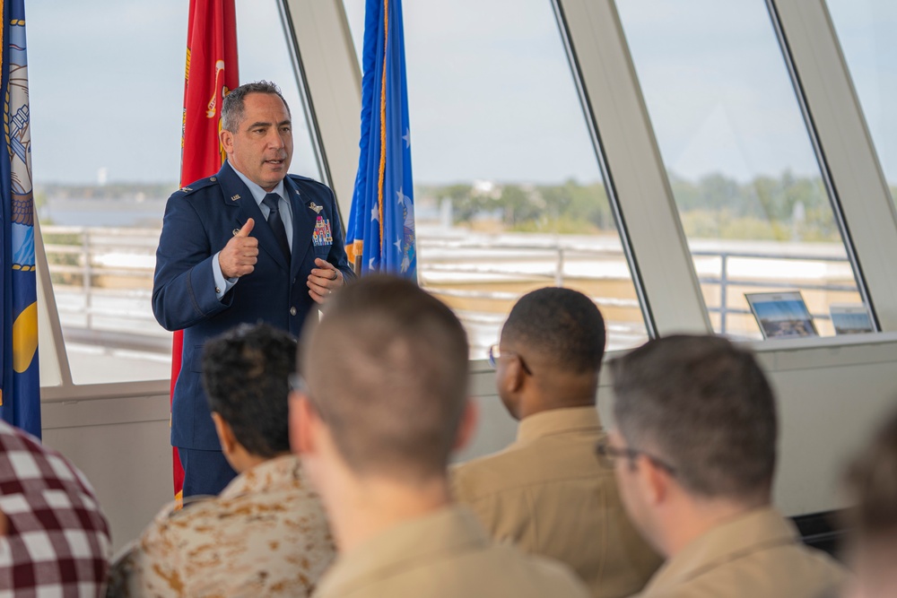 Col. Koslov speaks to graduates of the Spectrums Operations Apprenticeship course