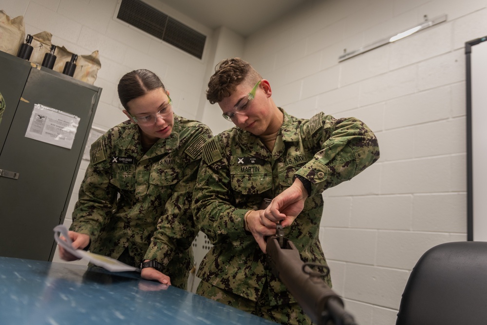 New Accession Sailors Conduct Weapons Training