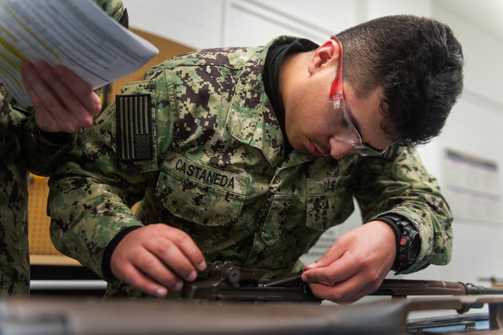 New Accession Sailors Conduct Weapons Training