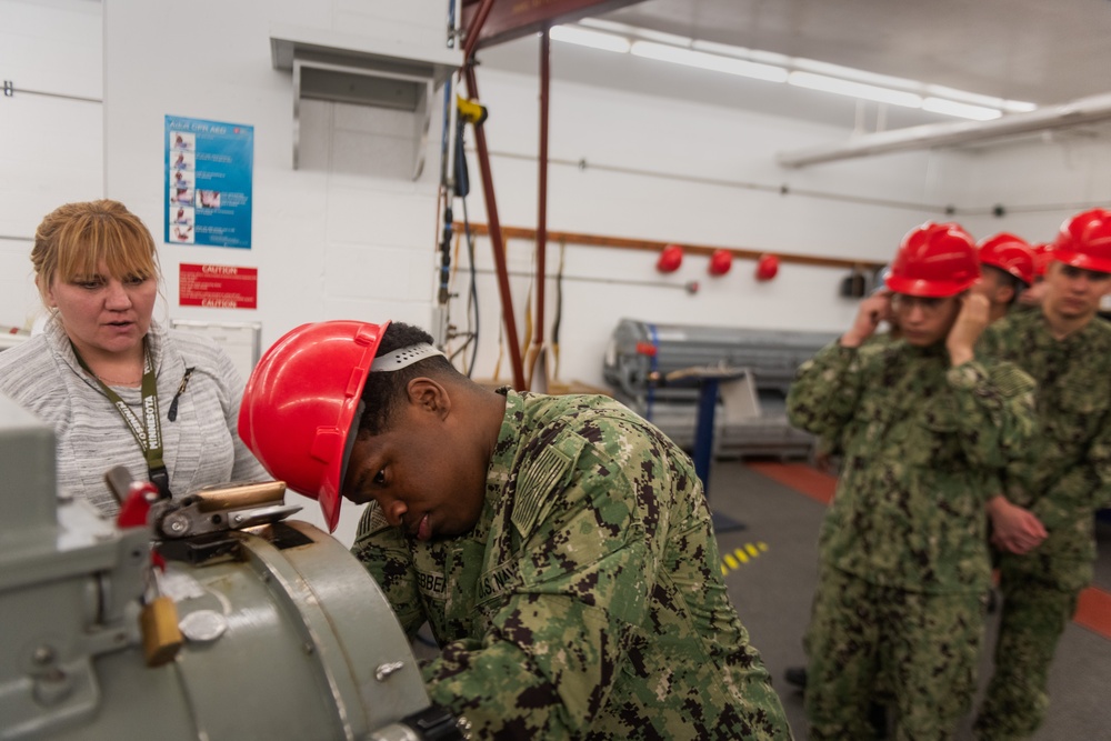 New Accession Sailors Conduct Weapons Training
