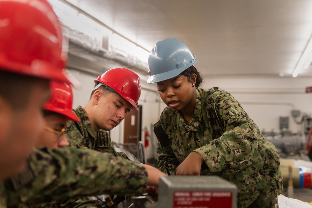 New Accession Sailors Conduct Weapons Training